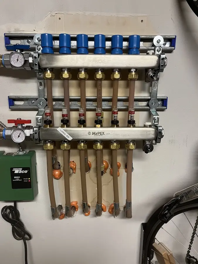 Plumber performing Water Heater Repair at a residential property in Helemano